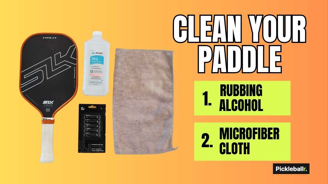 Rubbing alcohol and a microfiber cloth to clean your pickleball paddle